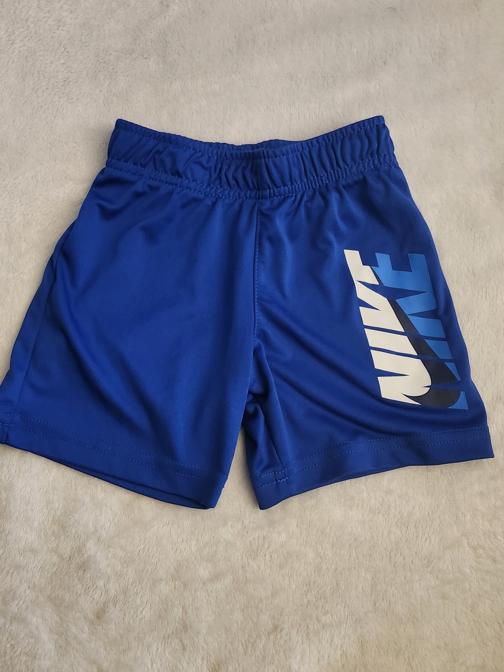 Nike Royal Blue Kids' Athletic Shorts with Vertical Logo